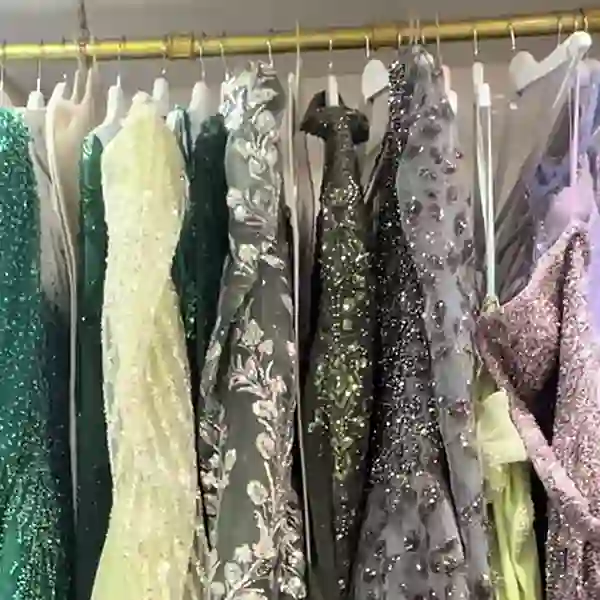 Rail of embellished modest occasion dresses at La Glamour Manchester
